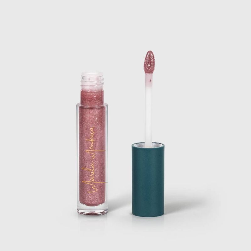 embalagem aberta com tampa ao lado direito Brilho Labial Rosa Marília Mendonça By Océane Lip Gloss Rose