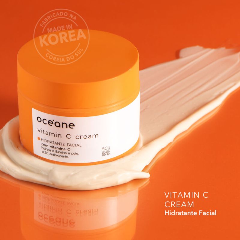 Creme-Hidratante-Facial-com-Vitamina-C-embalagem-fechada-com-textura-ao-fundo