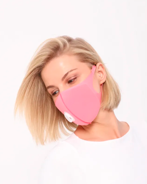 Banner Bem-estar Máscara de proteção Océane, a foto mostra uma máscara de proteção com respirador lavável rosa.
